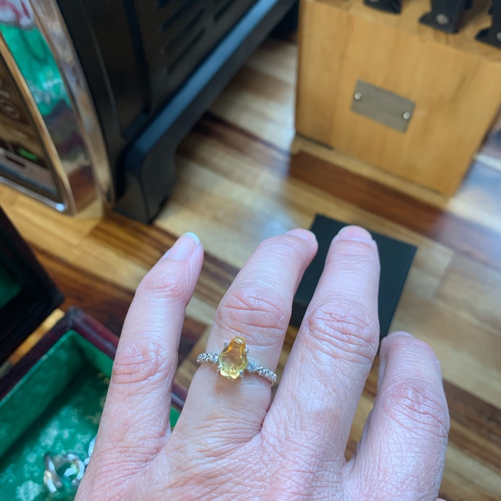 Elegant citrine color  stone.Adjustable ring